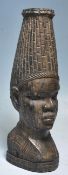 A 20th Century large African tribal well-carved hard-wood bust of a Nigerian woman with strong