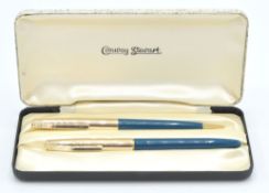 A boxed set of two Conway Stewart vintage writing pens to include one fountain ink pen and a