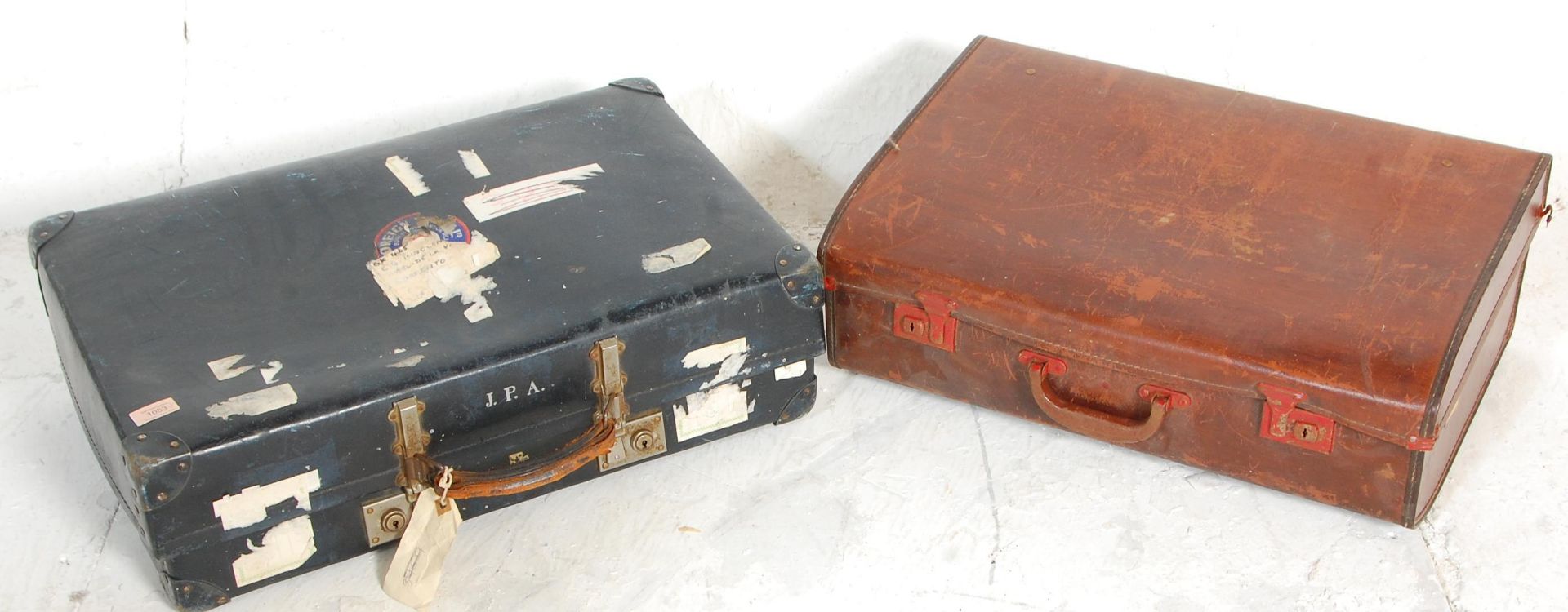 Two vintage retro mid 20th Century leather cased travelling suitcases / trunks to include a faux - Image 2 of 7