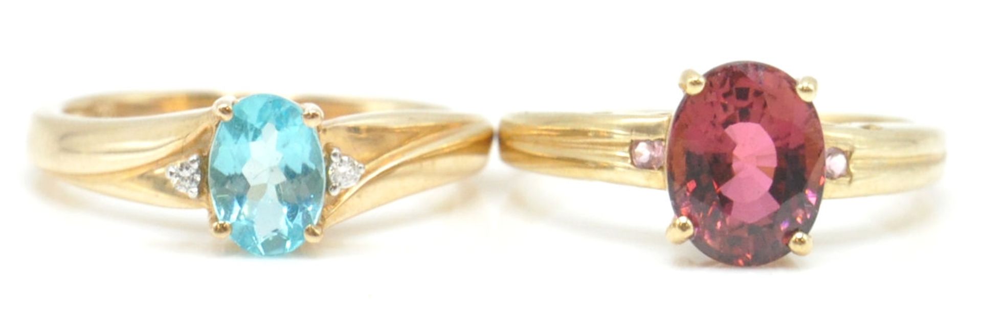 2 9ct gold hallmarked rings. To include a topaz and diamond ring in shaped prong setting