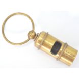 A brass replica whistle marked S Auld Maker Glasgow, RMS Glasgow White Line, with a large loop to