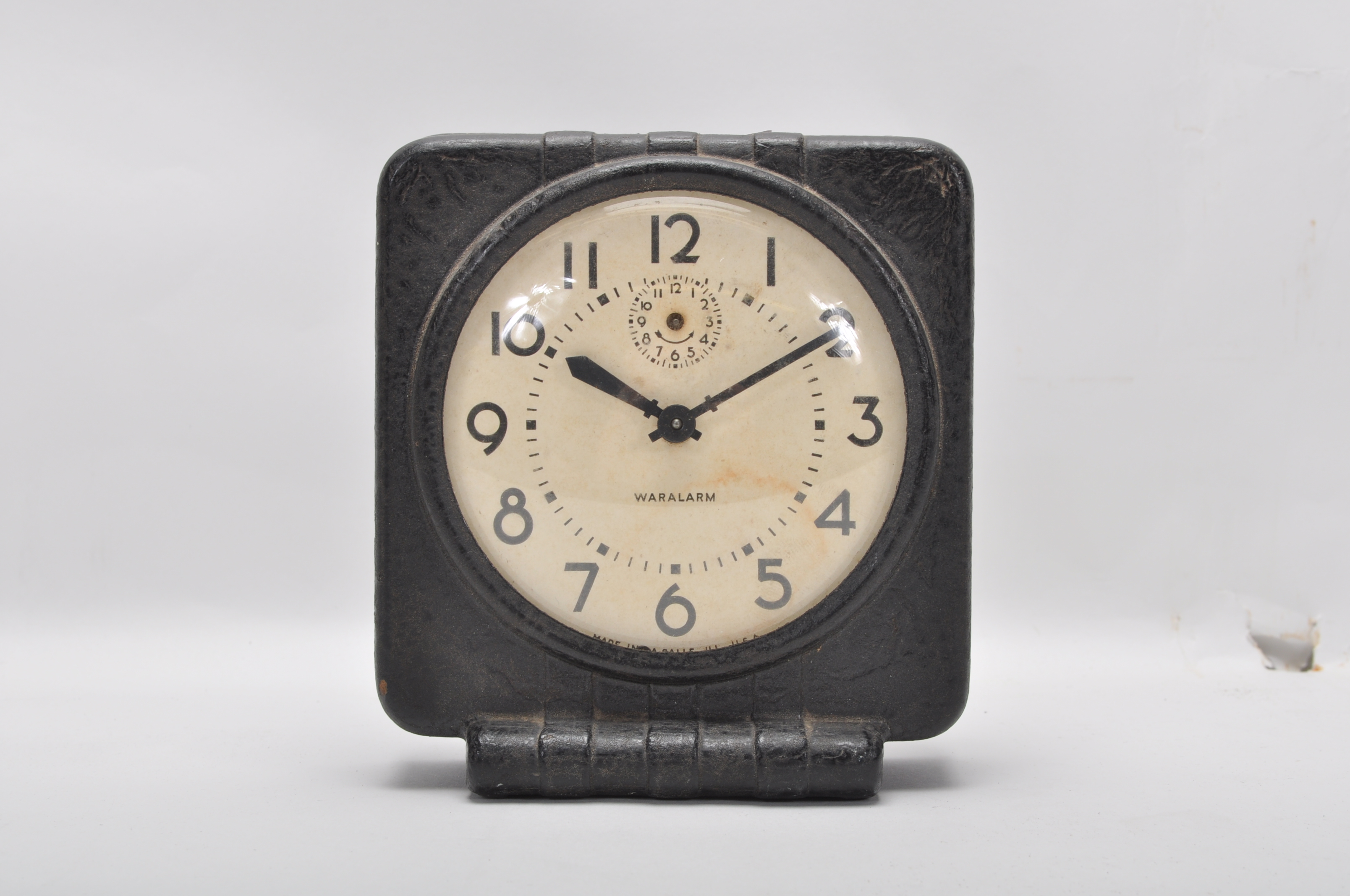 A mid 20th Century WWII era American Cardboard Waralarm War alarm clock made in 1944 by Western