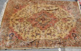 An early 20th Century Persian / Islamic floor rug having a central medallion with geometric