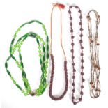 A good group of vintage glass bead necklaces with green and dark purple glass examples etc.