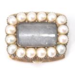 An antique Georgian 19th century pearl gold mourning bracelet clasp. The clasp set with woven hair