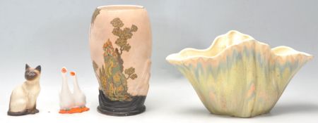 A mixed group of ceramics dating from the early half of the 20th century to include a pair of