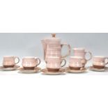 A vintage retro 20th Century Rye pottery coffee service consisting of coffee pot, six cups and