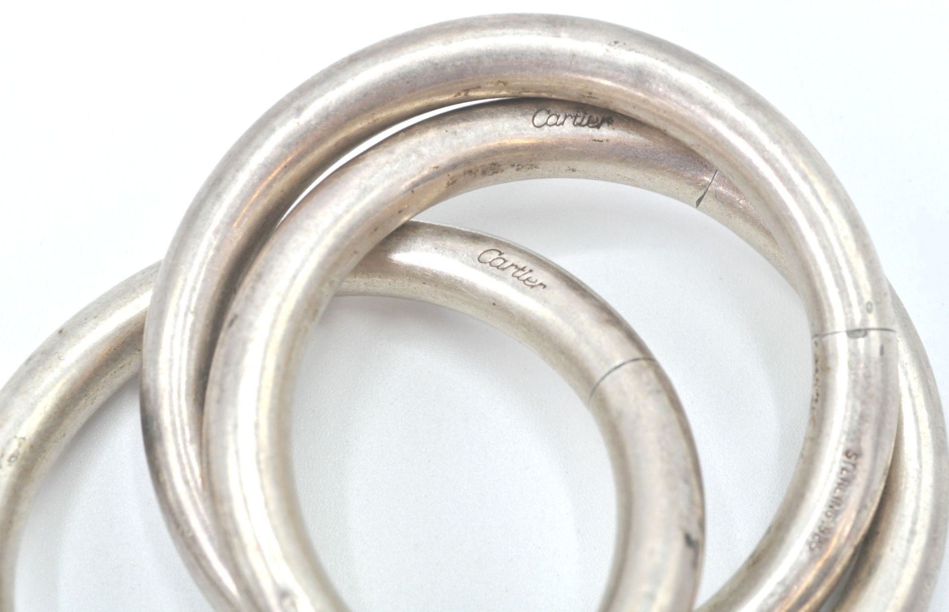 An early 20th century Cartier sterling silver puzzle rattler - teething ring with 3 conjoined - Bild 2 aus 6