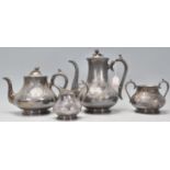 An early 20th Century good quality silver plate tea and coffee service having raised and engraved