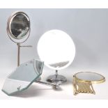A group of four vintage mirrors dating from the early 20th Century to include two Art Deco mirrors