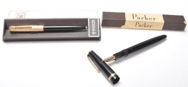 Two vintage Parker pens to include one black cased fountain ink pen with a gilt arrow clip, and a