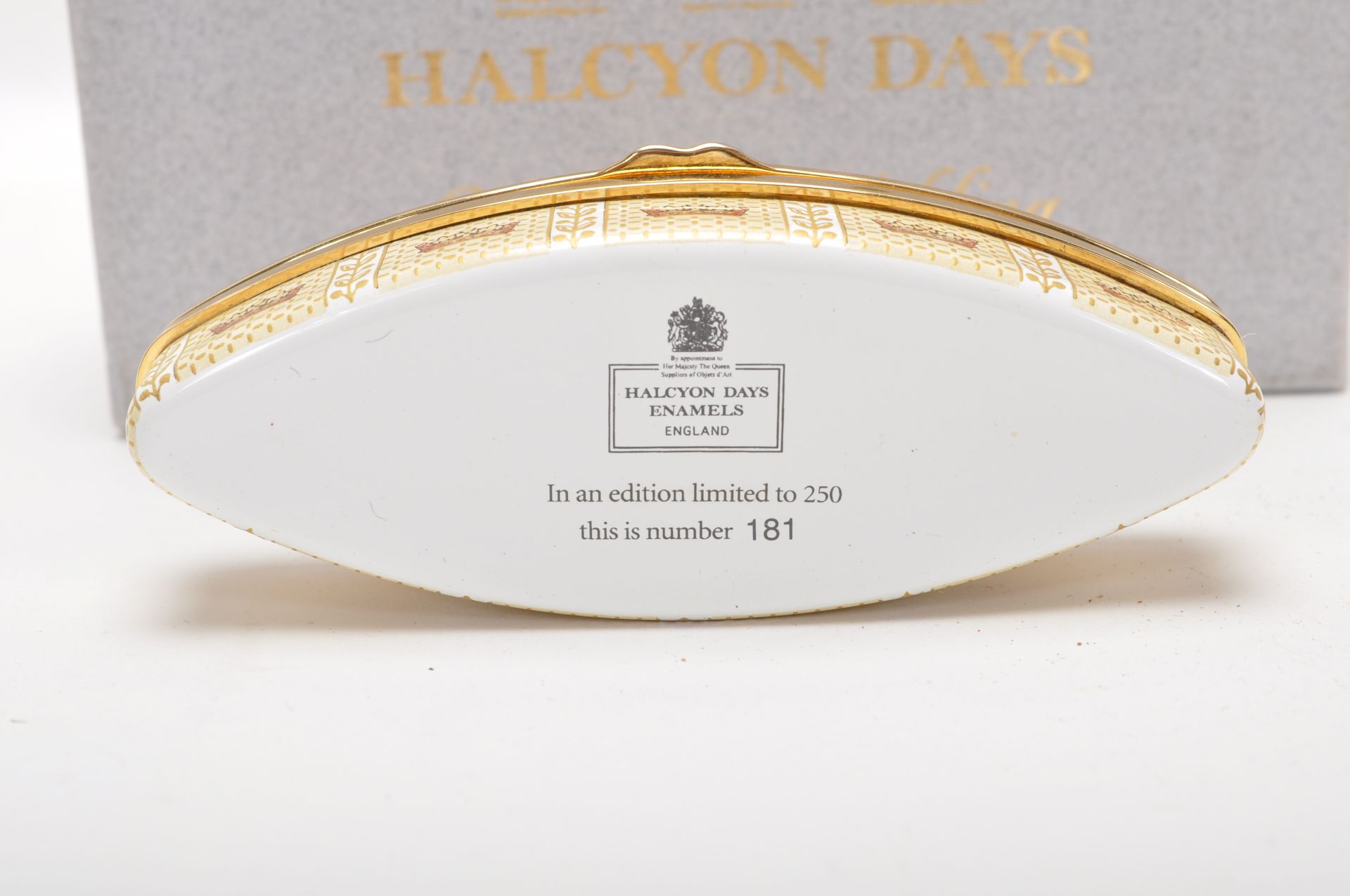 A Halcyon Days enamels navette shaped trinket box enamelled throughout with white and gilt - Image 4 of 5