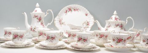 A vintage Royal Albert fine bone china Lavender Rose pattern tea service having pink rose decoration