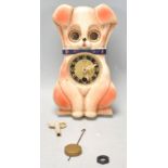 A vintage retro mid 20th Century Mi-Ken wall clock in the form of a dog having moving eyes. With