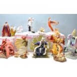 A collection seventeen Hollandscraft 'Enchantica' figures with wizards, dragons, fairies to