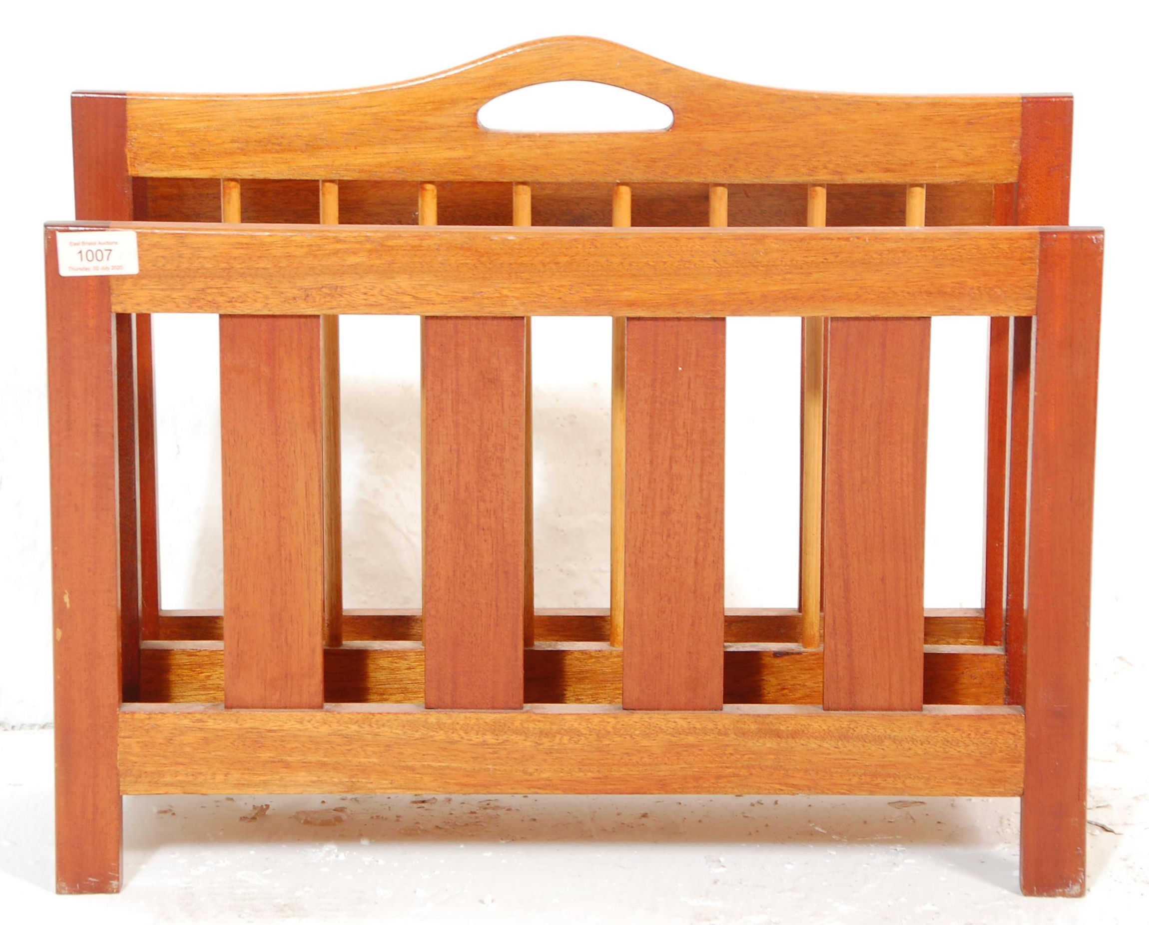 A retro 20th Century Danish teak wood retro magazine rack - canterbury. The panelled body with - Image 2 of 6