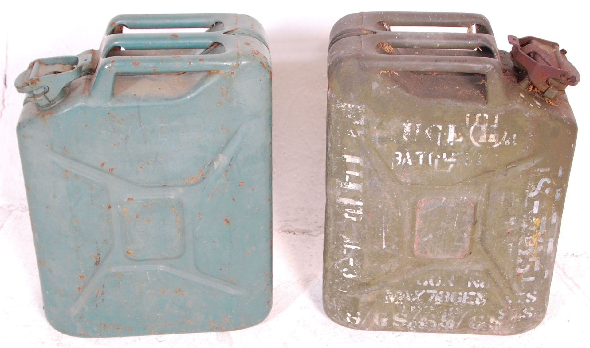 Two vintage 20th Century military jerry petrol cans, both retaining original green paintwork with - Bild 4 aus 5