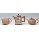 A collection of 3 Chinese terracotta yixing teapots. To include a hand painted red clay terracotta