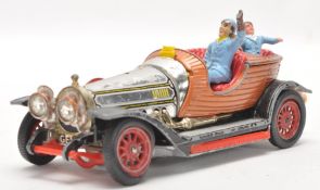 A vintage Corgi Toys Chitty Chitty Bang Bang diecast car with figures with cold painted detailing.