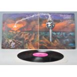 A vinyl long play LP record album by Van Der Graaf Generator – The Least We Can Do Is Wave To Each