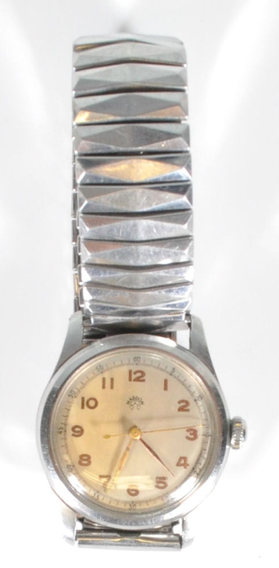 A vintage stainless steel gentleman's wrist watch having a champagne dial with Arabic numeral