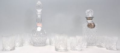 Two 20th Century cut glass decanters to include one whisky / brandy and one sherry decanter, the