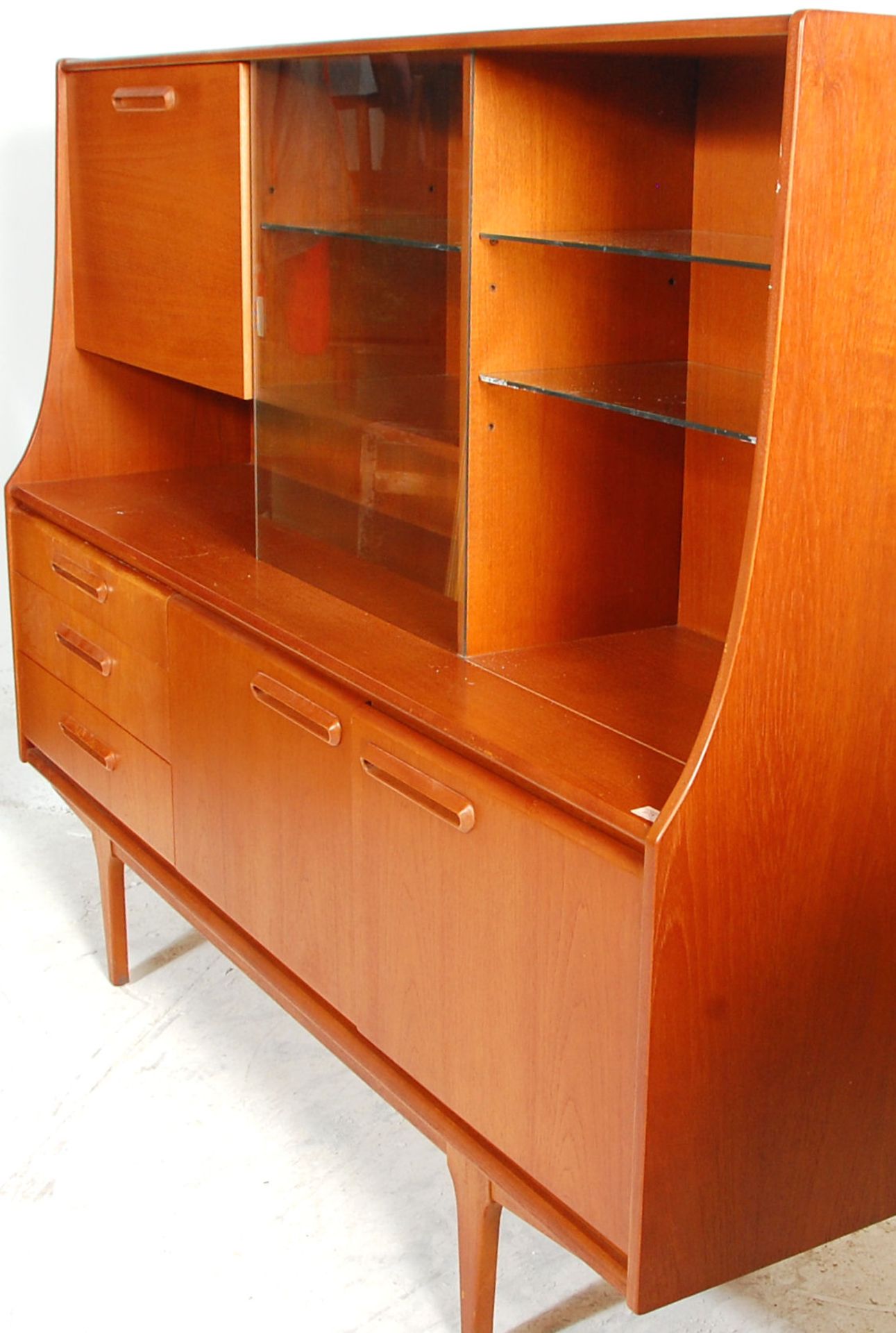 A retro mid 20th Century teak wood sideboard / highboard having a drop down cocktail cabinet to - Image 9 of 10