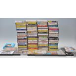A collection of retro vintage music cassette tapes to include Dolly Parton, Rolling Stones, Blondie,