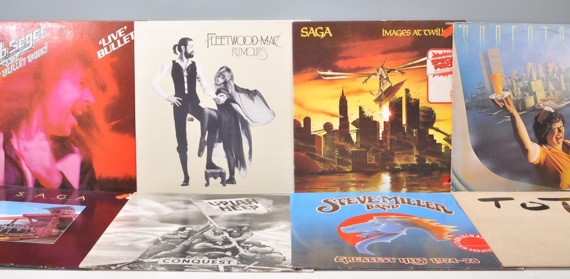 A mixed group of vinyl long play LP record albums to include Uriah Heep Conquest, Steve Miller Band,