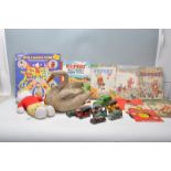 A collection of vintage children's toys to include a selection of Rupert annual books, a Rupert Bear