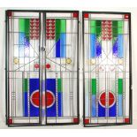 A group of three 20th Century leaded stained glass panelled doors each being set with green, blue