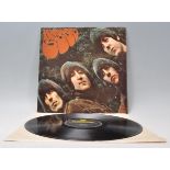 A vinyl long play LP record album by The Beatles – Rubber Soul – Original Parlophone 1st U.K.
