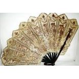 An antique 19th century Indian / Asiatic style hide / skin ladies fan. Usual form, with painted hide