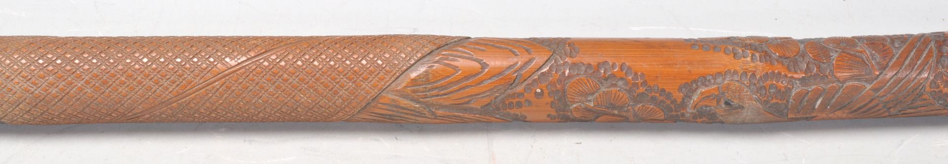 A heavily carved sword stick / walking stick decorated with a carved monkey with floral and - Bild 4 aus 8