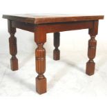 A 1930's Art Deco oak refectory draw leaf dining t