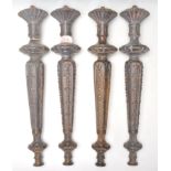 A set of 4 unusual believed 19th century cast bronze tapering table legs. Each with tapering columns