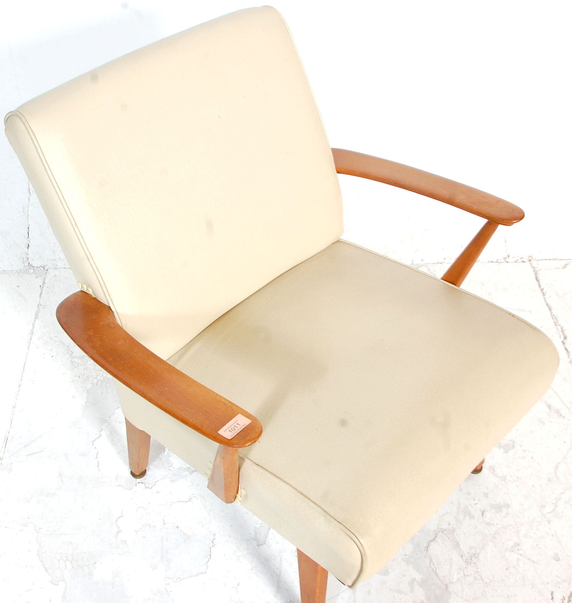 A good retro 20th Century teak framed armchair / chair having a white leather covered backrest and - Image 2 of 4