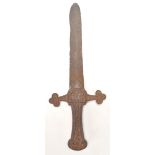 An unusual cast iron dagger with shaped blade and hand guard having tapering handle. Likely 19th