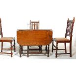 A good early 20th Century oak pie crust barley twist gate leg dining table of rectangular form