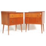 A matching pair of retro mid 20th Century teak chest of drawers raised on teak tapering supports.