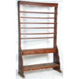 A 19th century Victorian large country stained pine open plate rack shelf wall unit having three