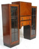 A good early 20th Century 1930's Art Deco mahogany veneered kneehole bureau bookcase desk, having