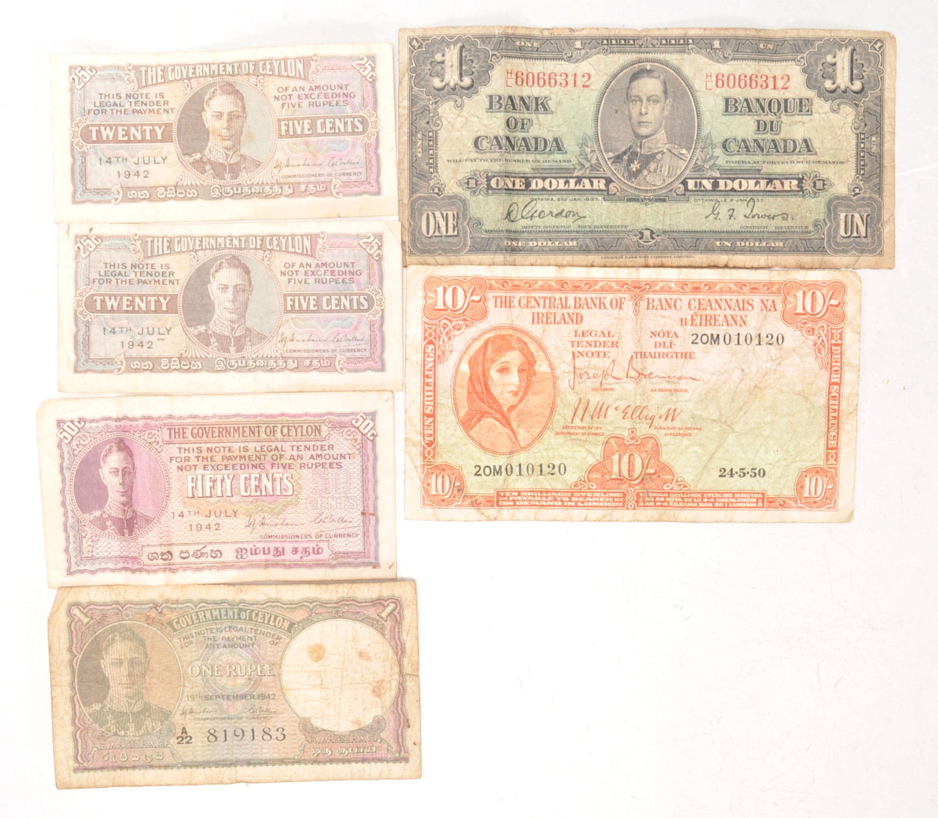 A collection of 20th Century bank notes to include George VI notes; 2 x Ceylon twenty five cents