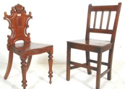 A 19th century Victorian solid mahogany hall chair having  carved back rest with carved scrolled