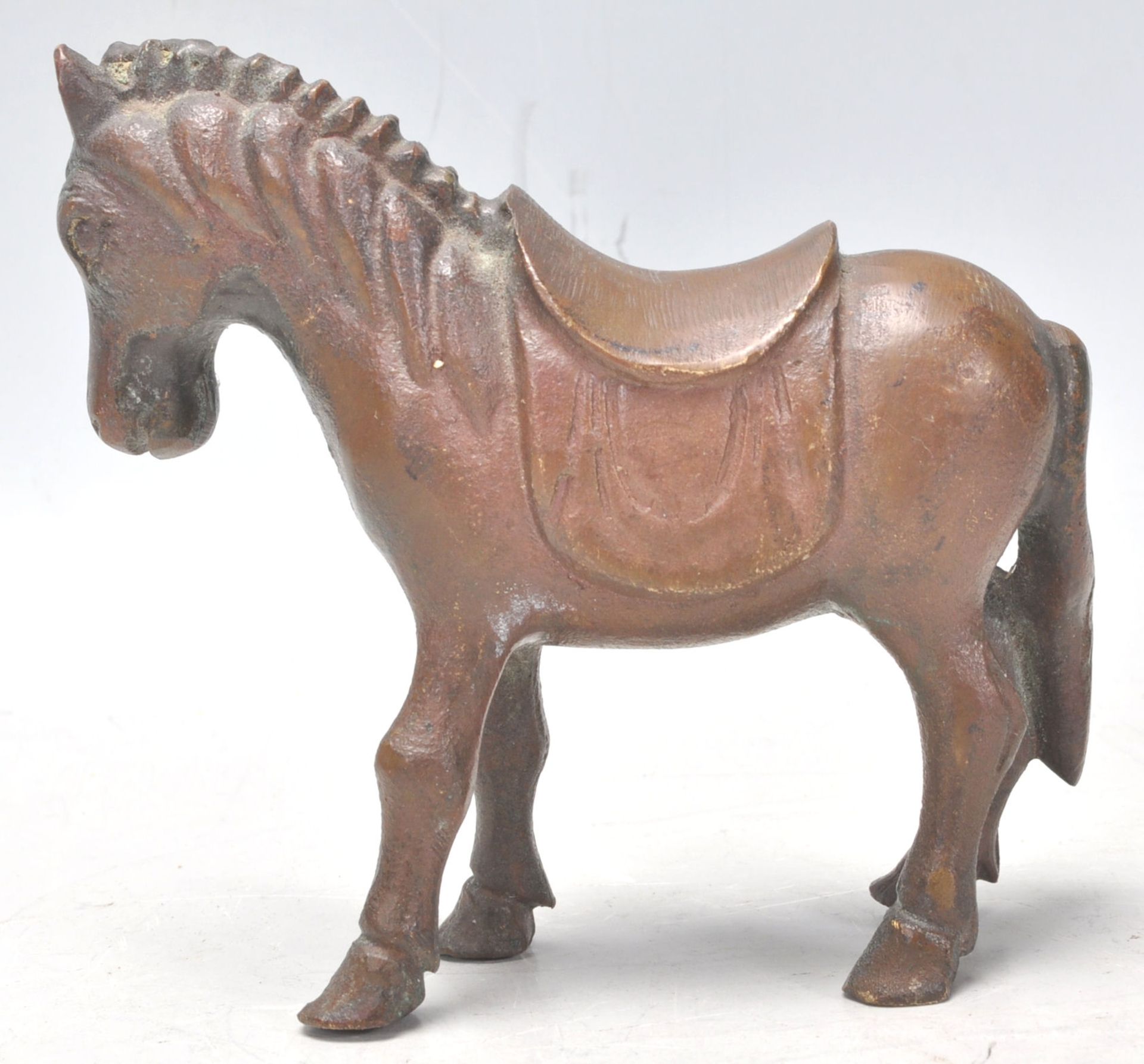 A mid 20th Century cast bronze figure in the form of a horse in a standing position having a - Bild 4 aus 7