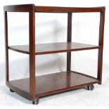 A retro mid century Danish inspired teak wood butlers / hostess trolley. The trolley with 3 tiers