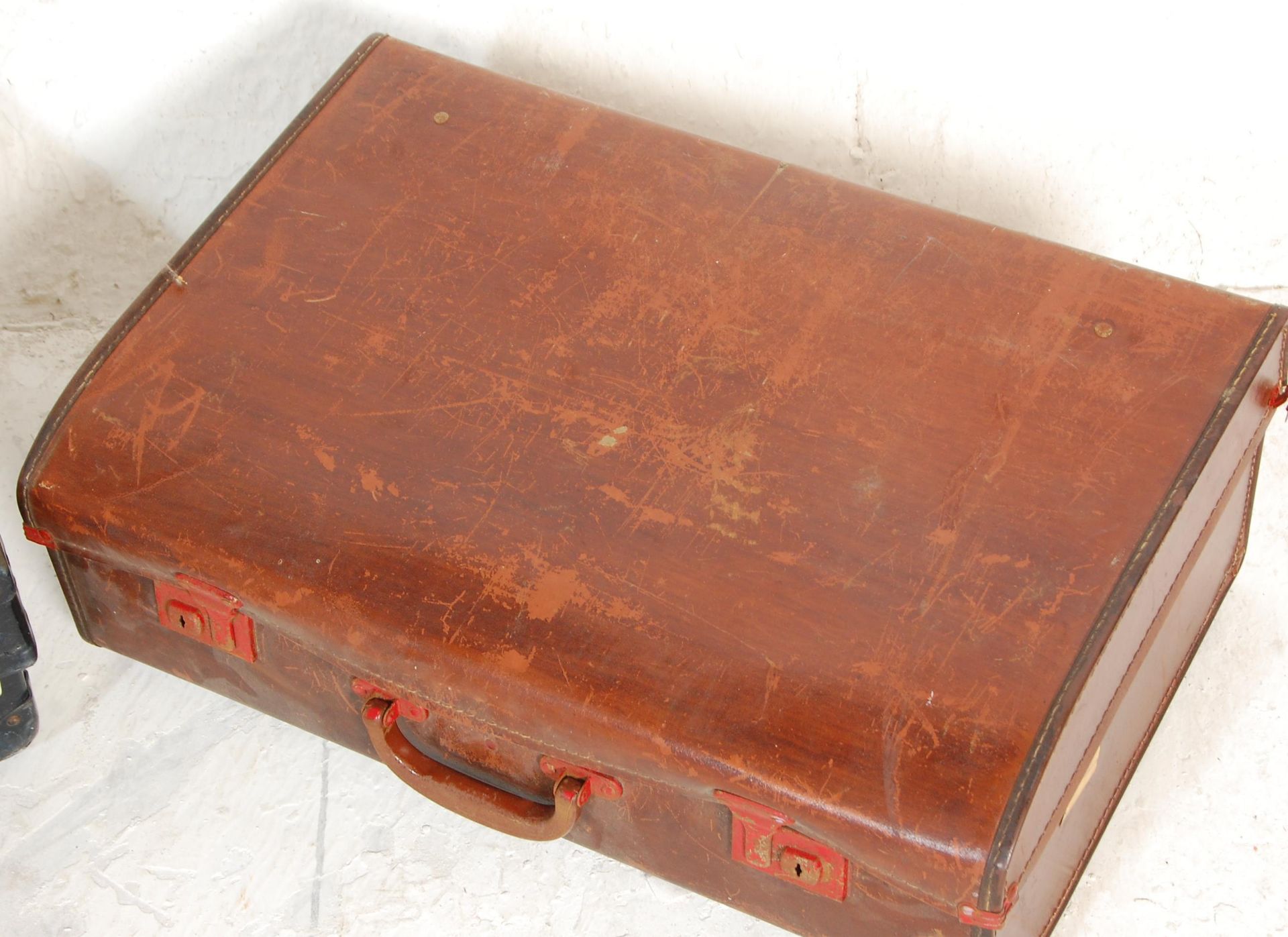 Two vintage retro mid 20th Century leather cased travelling suitcases / trunks to include a faux - Image 4 of 7
