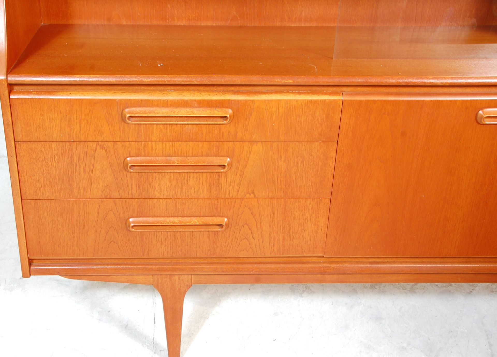 A retro mid 20th Century teak wood sideboard / highboard having a drop down cocktail cabinet to - Image 2 of 10