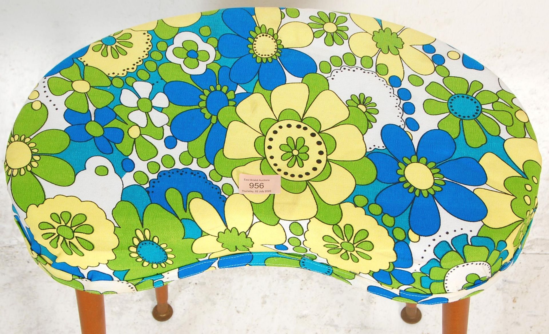 A retro vintage kidney shaped stool upholstered in blue yellow and white fabric raised on tapering - Bild 3 aus 5