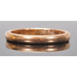 A hallmarked 22ct gold band ring of simple form. Hallmarked Birmingham 1984. Weight 3.3g. Size J.5.
